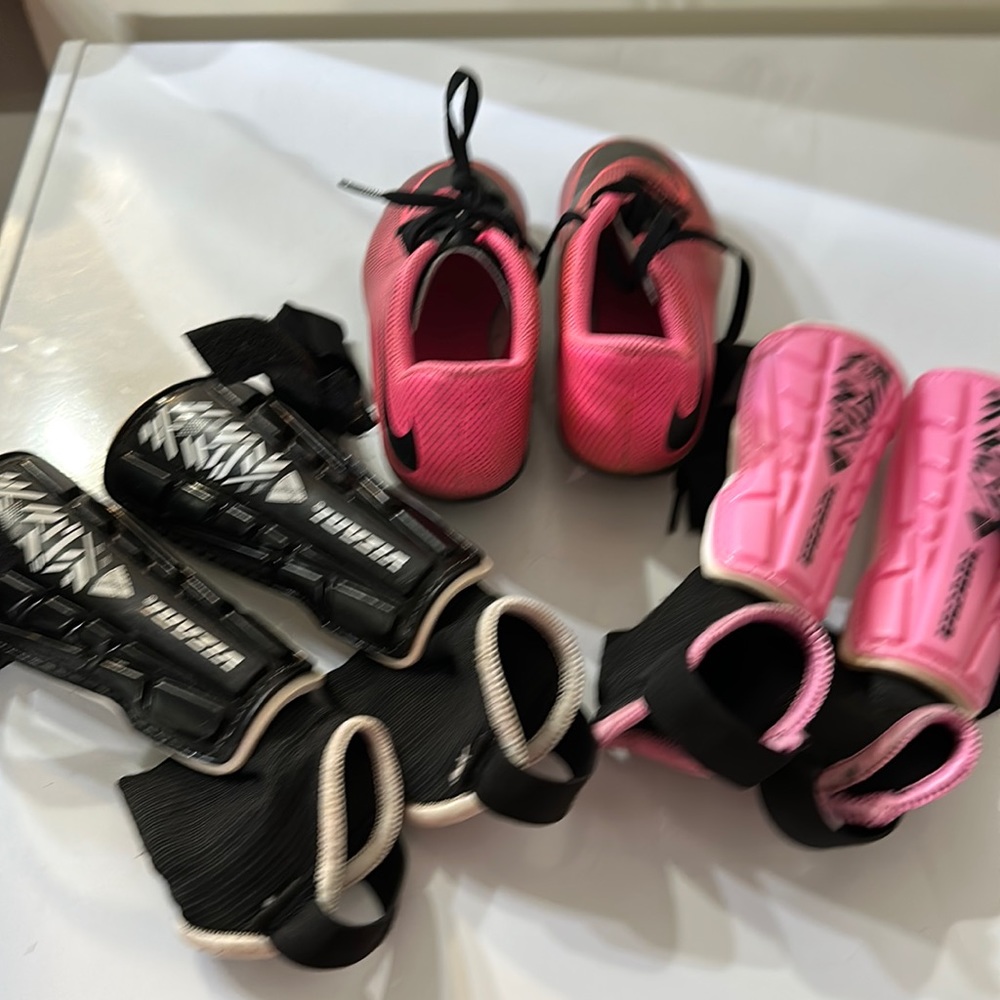 Girl Soccer cleats and shinguards